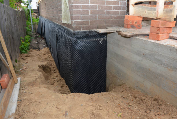 SJ Waterproofing Pros technician performing targeted Foundation Crack Repair assessment in Auburn, WA